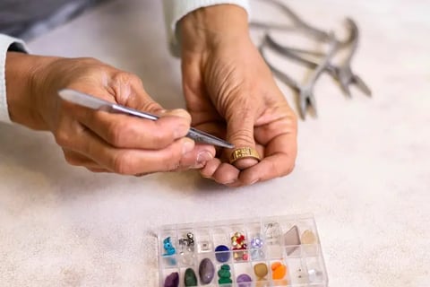 Jeweler at Work Designing a Ring