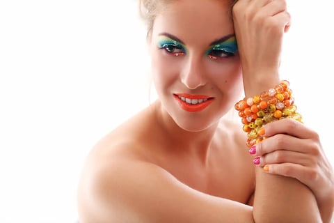 Woman Embracing the Power of Gemstone Jewelry