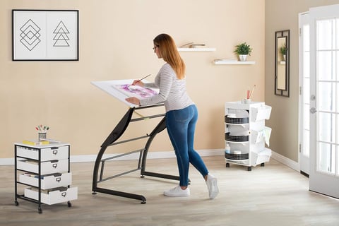 Versatile desk transitions between sitting and standing positions