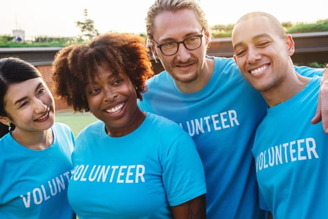 FAIF Foundation volunteers showing unity at a mental health awareness event in Louisville