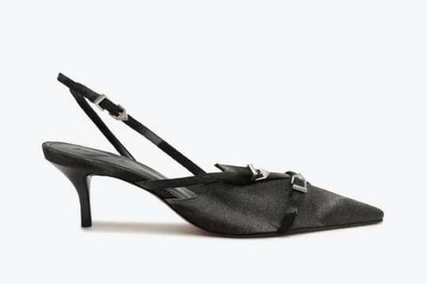 a woman's shoes with a bow tie