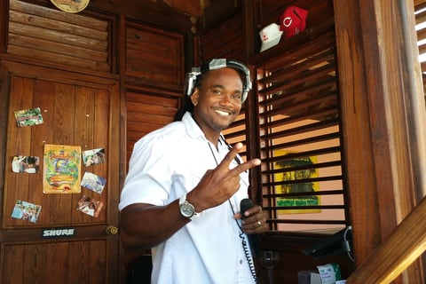 The DJ takes requests at the swim-up bar at Margaritaville on Grand Turk Island