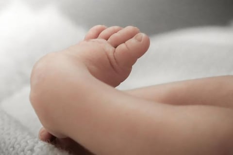 a baby's feet and toes are shown in this image