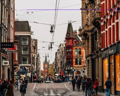 amsterdam - a city street scene with a trampoline trampoline trampoline tram