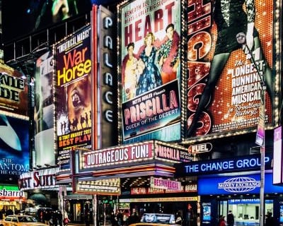 New York - a taxi cab cab driving down a busy street
