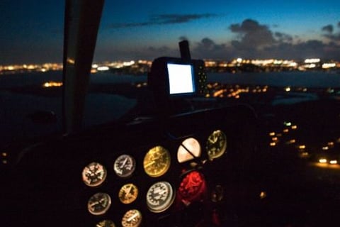 a view of a plane in the night sky