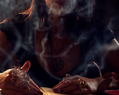 magic - a woman with a cigarette in her hand