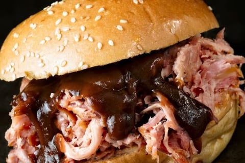 a sandwich sandwich with meat and cheese on a bunt