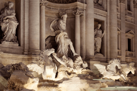a fountain with statues of angels on it