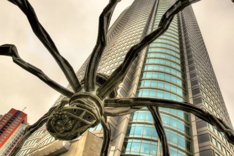 a spider art in front of a building