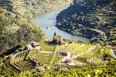 a boat sailing on a river in the middle of a valley