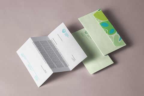 Light green envelope with zoo camouflage. 