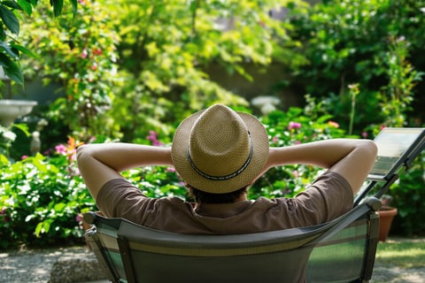 Guy Sitting in Garden