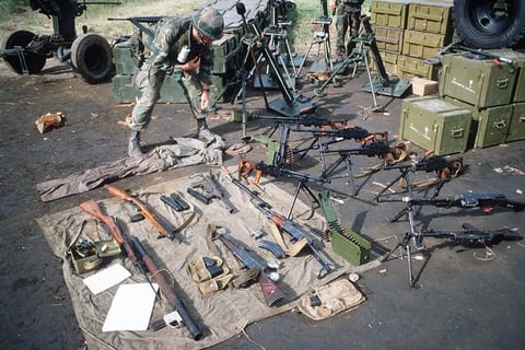 A Display of Captured Soviet-Era Weapons with a Mosin-Nagant in the Foreground