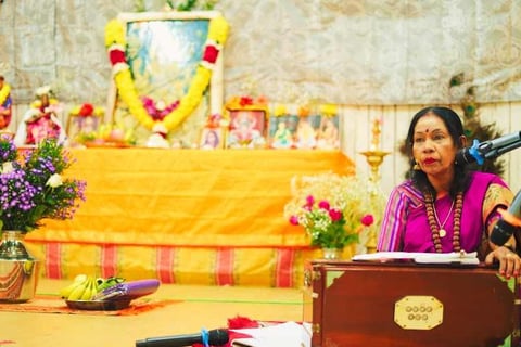 mataji laxmi teaching on stage