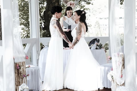 a bride and groomsmid getting married