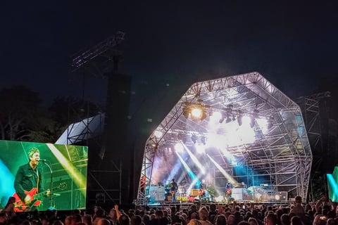 Noel Gallagher - live at Caldicot Castle in 2023 - stage at night - Music in Wales - Nick Langston