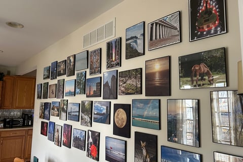 a wall of picture wall art and kitchen wall art