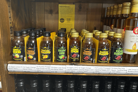 Toad Sweat bottles on shelf in wooden cabinet