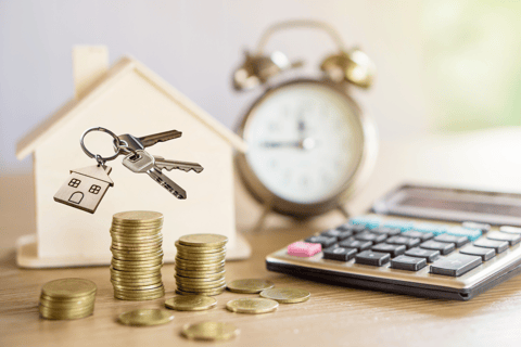 A homebuyer reviewing a budget before purchasing
