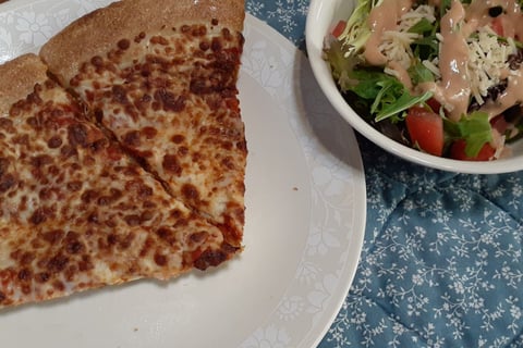 cheese pizza with salad and diet root beer