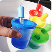 a person holding a cup of water in a cup