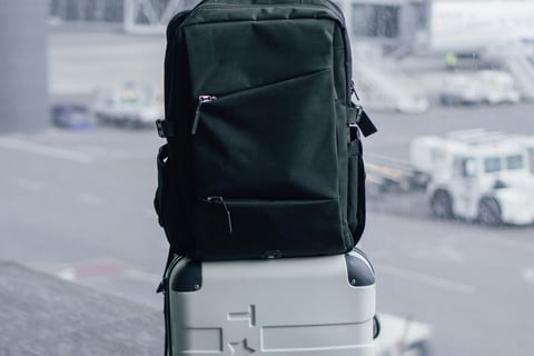 a suitcase with luggage on a luggage bag