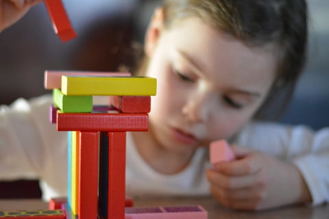 kid with blocks