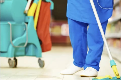 Woman Cleaning a Floor