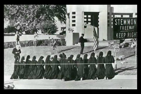 PRAYERS BEING SAID IN DEALY PLAZA