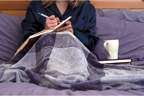 Person feeling empowered after an online mindfulness for migraine support session