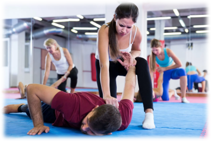 3 women blocking 3 men using self defence techniques