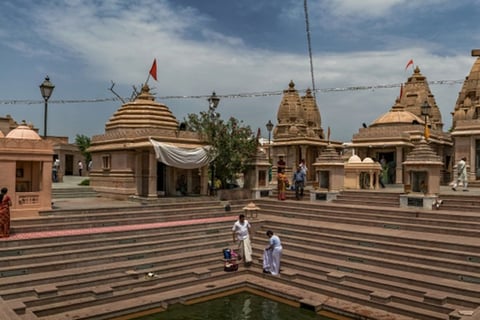 Pilgrims performing Shraddh rituals at Matrugaya temple in Siddhpur, Gujarat