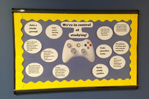 video game bulletin board with positive quote "We're in control of studying"