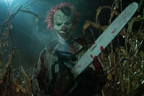 Frendo the Clown with a chainsaw