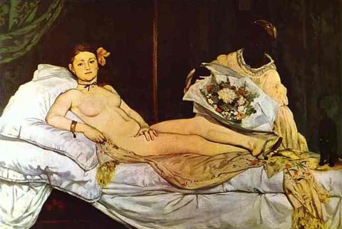 a painting of a woman laying on a bed