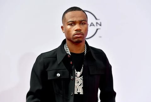 Roddy Ricch in designer streetwear at a music video shoot
