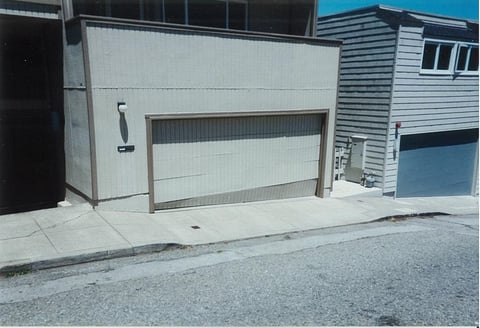 Weather damaged garage door in San Francisco.