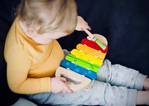 kid with musical instrument