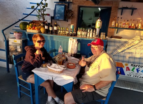 Lady and The Pirate convince the owner to open the restaurant just for them in Santorini, Greece