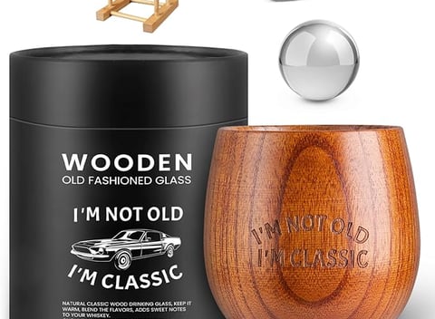 a wooden wine glass with a wooden spoon and a wooden spoon