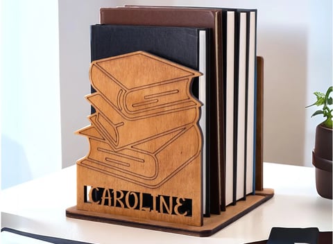 a stack of books with a book on top of it