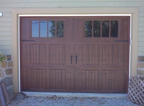 New steel carriage style garage door installed.