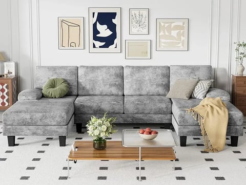 a couch with pillows and pillows on it