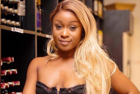 Efia Odo in a black dress.