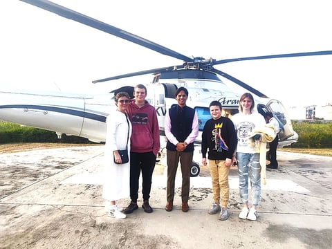 Muzammil (in the center) leading an exotic tour of Agra and Jaipur for a family travelling on their Private Jet