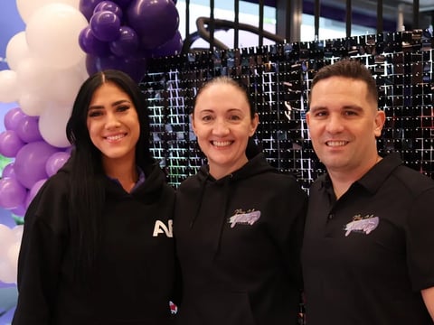 SweetAz Co. crew with Renee from AF Chermside with the black shimmer wall, grand opening.