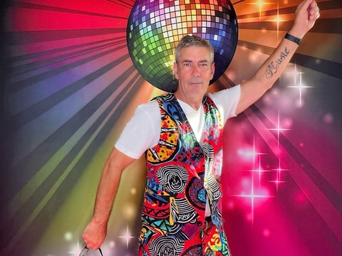 DJ Vella striking a disco pose in the digital photo booth hired for MS Foundation Fundraiser Capalaba.