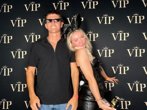 Two guests at Josiah's 18th birthday at the Football Hub in Albion in the VIP photo booth.