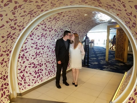 Zach and Kyrstin before their anniversary dinner in Wonderland on Harmony of The Seas